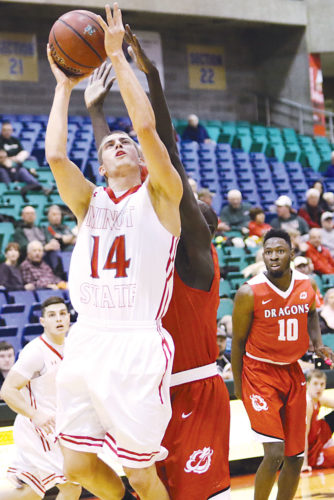 Sean Arbaut/Minot State athletics Minot State's Nathan Mertens (14) drives to the lane during a men's college basketball game on Friday at the MSU Dome in Minot.